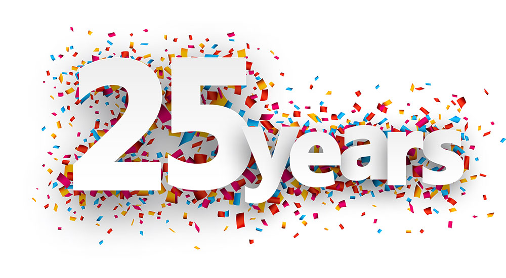 Image of Twenty five years paper sign over confetti.