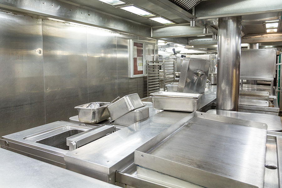 Image of Stainless Steel Grill and Trays in Commercial Kitchen