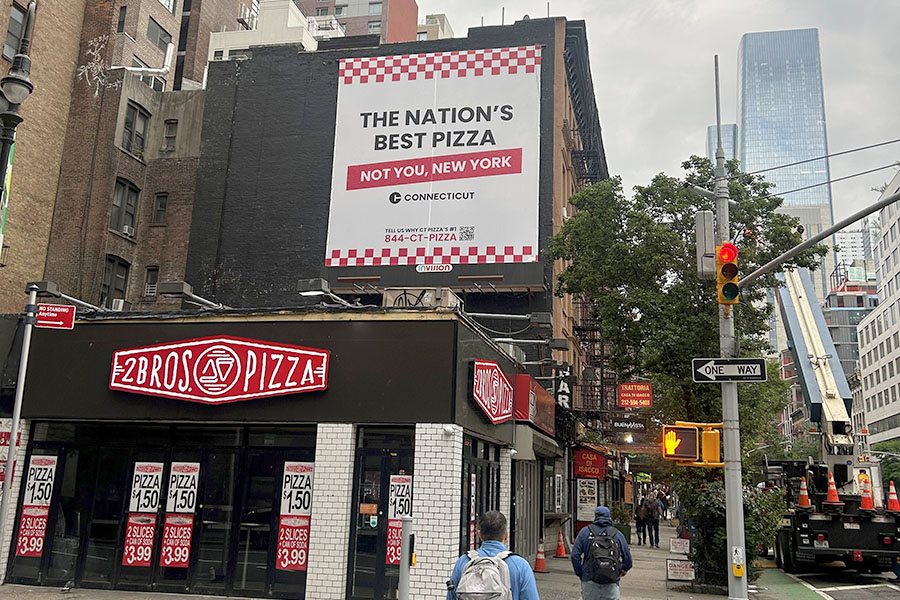Image of a billboard at 40th Street and 9th Avenue in Manhattan reading, "The Nation's Best Pizza - Not You, New York."