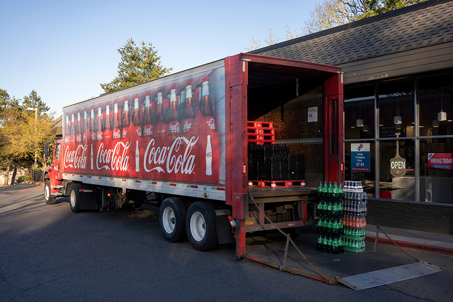Image of a Coca-Cola delivery truck making a delivery at Lake Oswego, Oregon.