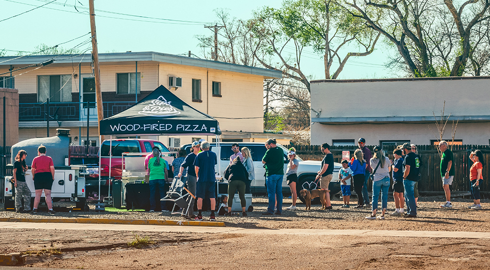 The Cipriani family works the grand opening for Sips & Pies Wood-Fired Pizza.