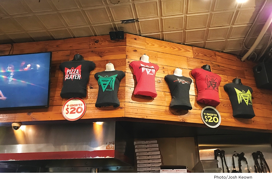selling merchandise, t-shirts on display at Greenville Avenue Pizza Company in Dallas Texas