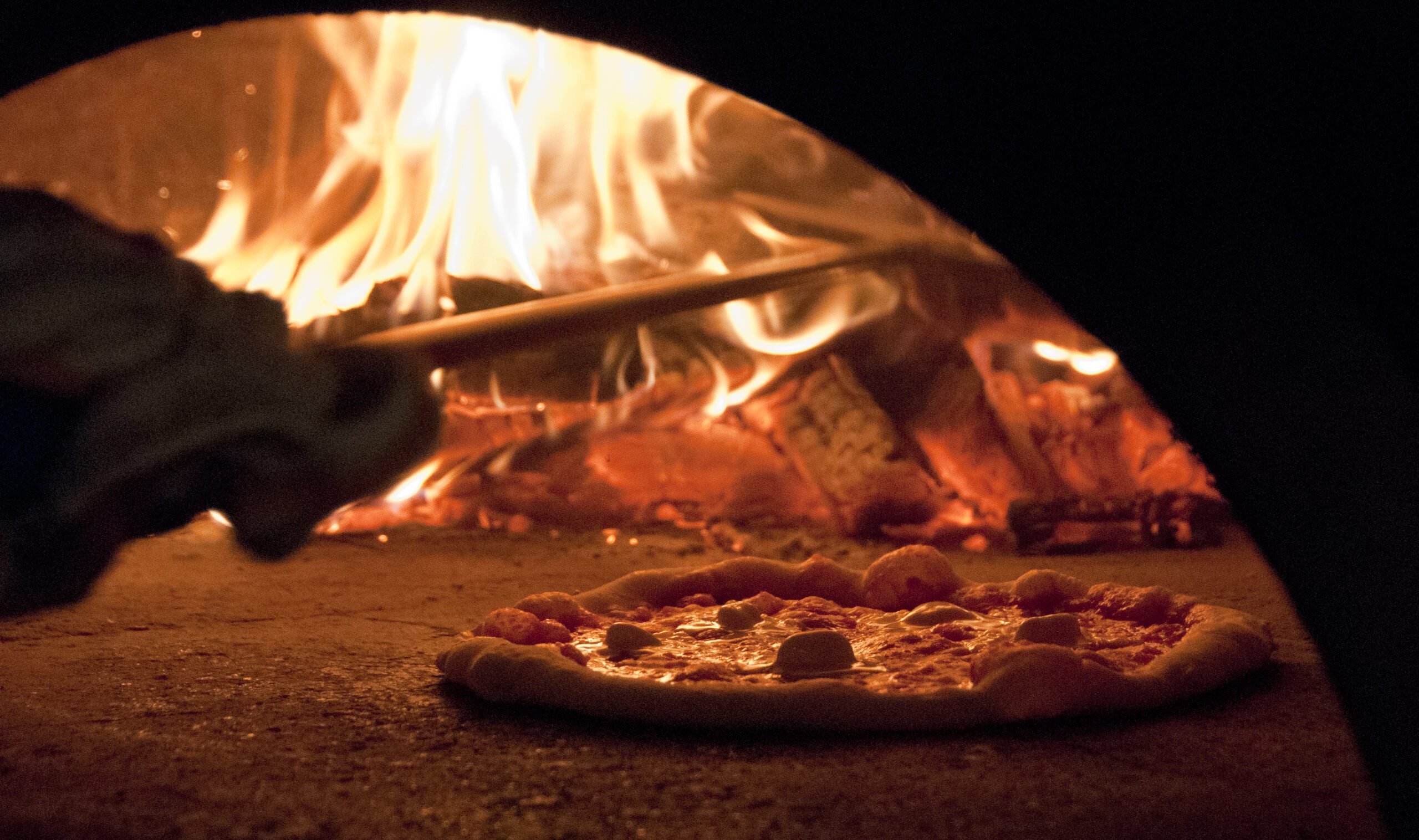 bubbled pizza crust in oven