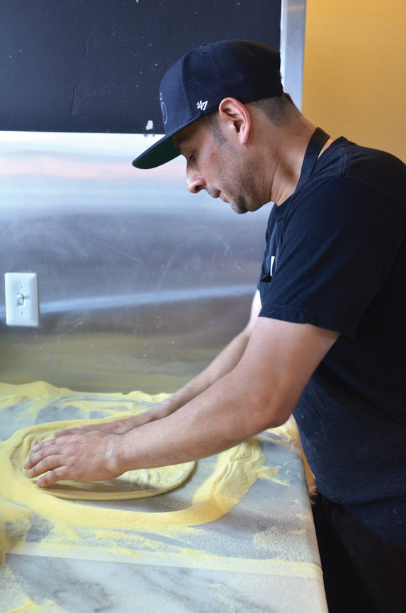 stretching pizza dough